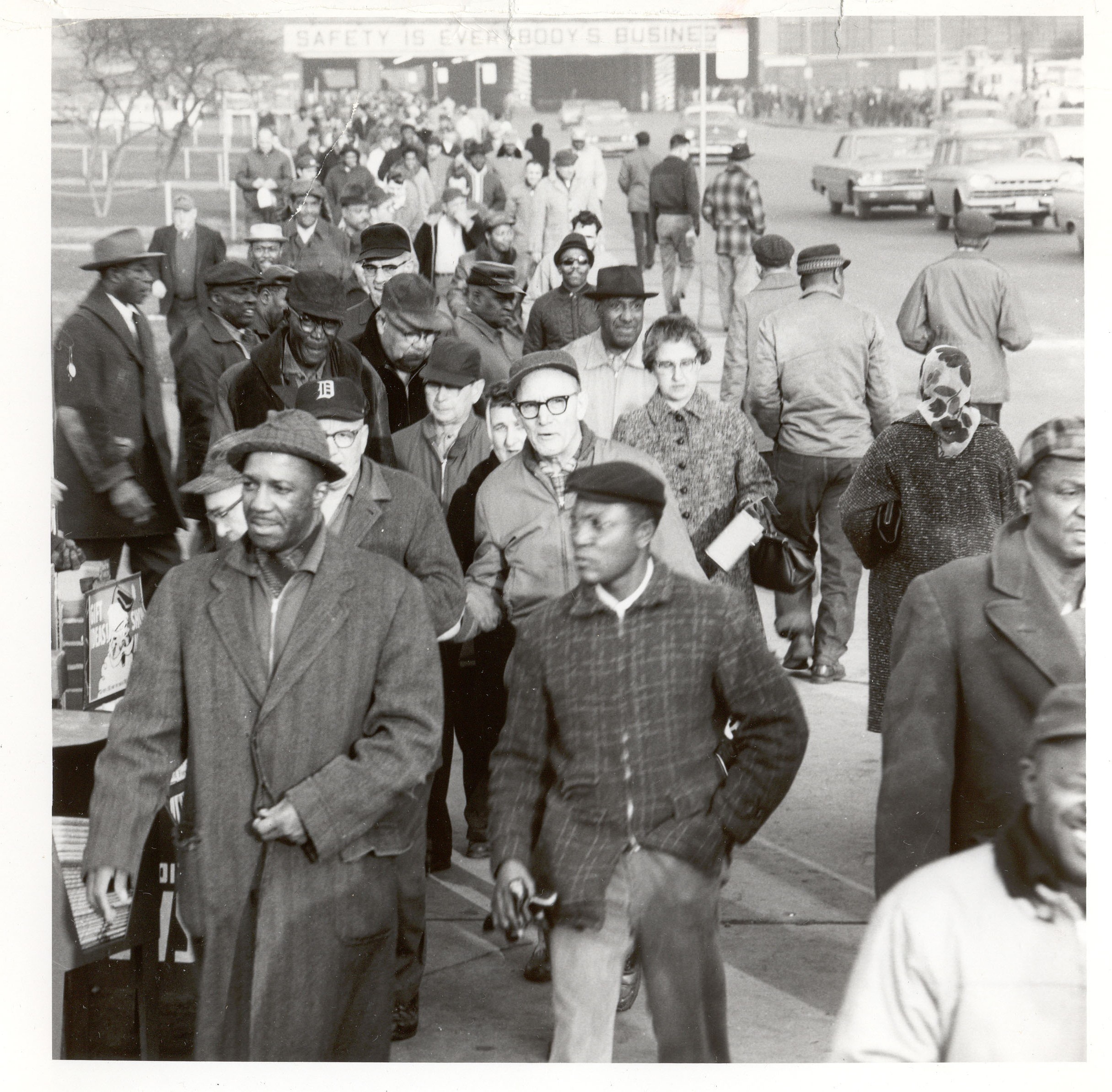 Ford employees, seen here leaving a plant, represent a burgeoning divers middle class.
